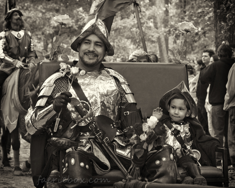 Javier and Michael ride in the parade